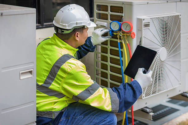 Professional Heat Pump Repair technician working in Phoenix, IL
